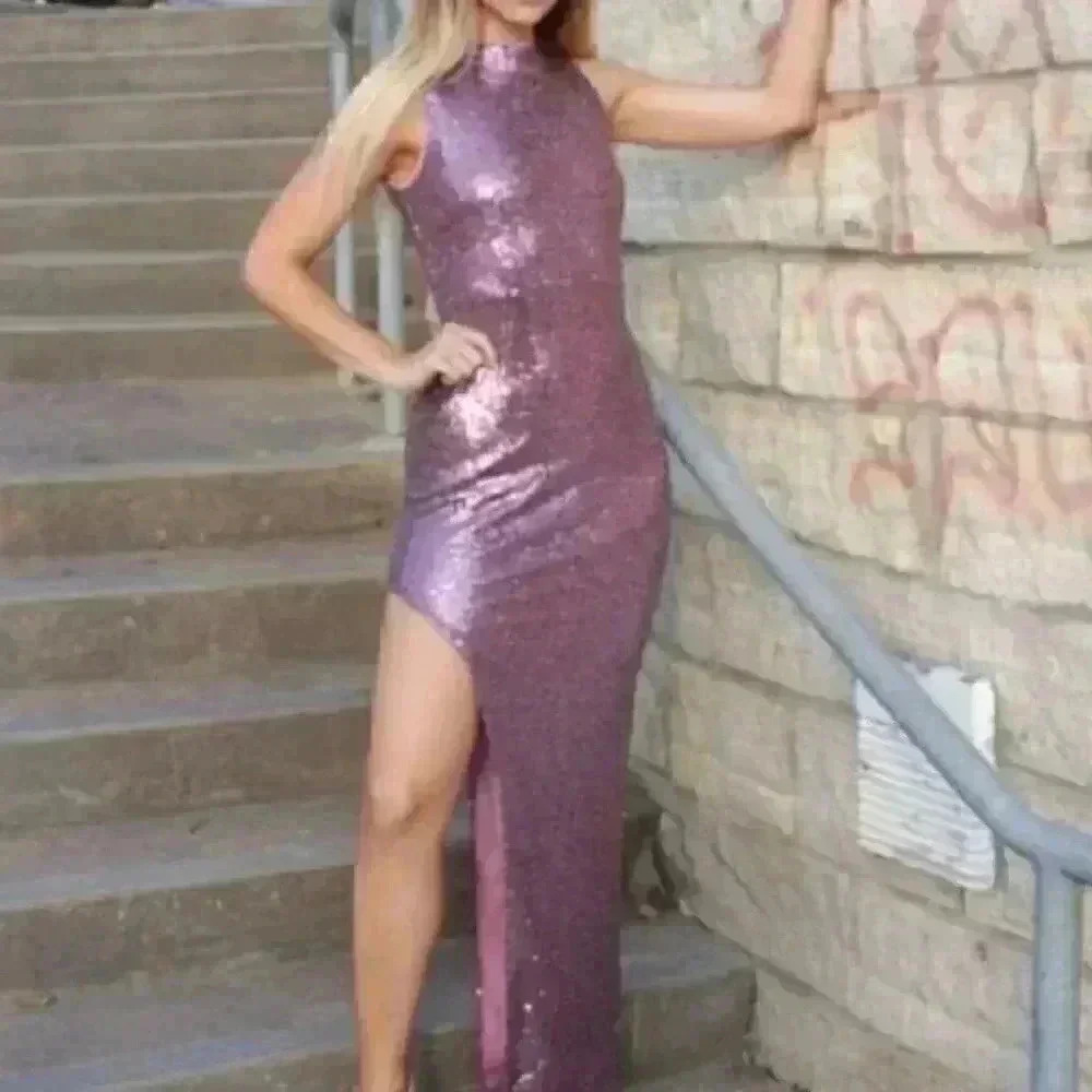 Purple sequin maxi dress with thigh high slit. ZIP